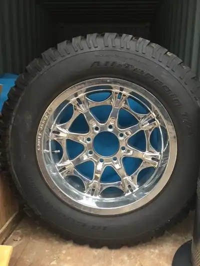 New Wheel & Tire combo mounted & ballanced. Never installed on truck. Wheels Jesse Widow Chrome 22"...