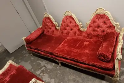 Vintage Red Velvet sofa aprox 8 feet long and arm chair set in great condition. Super comfortable