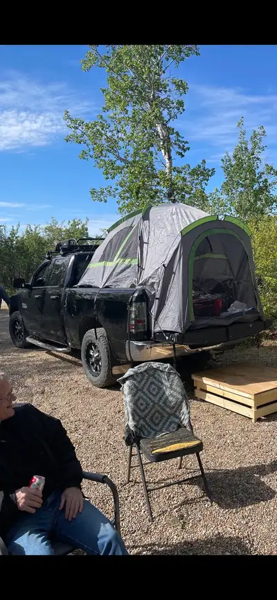 Tent for back of truck box. Do not need it anymore. Use it twice. $100