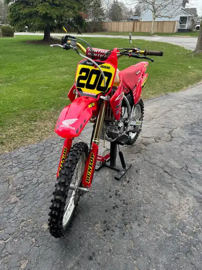 Has 89 hours, well maintained. Put a new tire on it last summer. It Runs great. Comes with a larger...