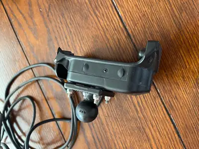 Garmin Zumo 550 GPS mounting cradle. Has attached RAM mount ball. Was in working condition when I re...