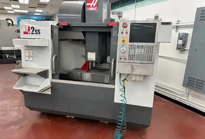 2012 HAAS VF-2SS SPECIFICATIONS: X-AXIS 30" Y-AXIS 16" Z-AXIS 20" POWER 30 hp RPM 12,000 RPM # ATC 2...