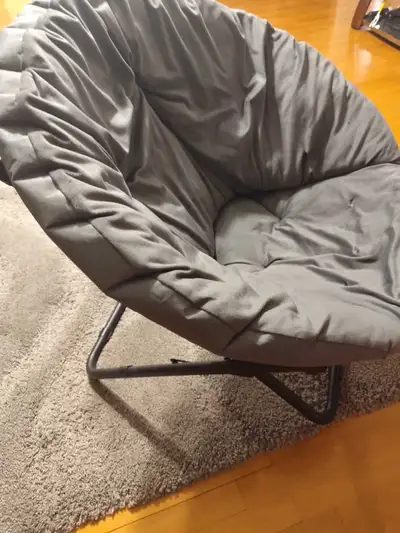 Sink into relaxation with this Urban Outfitters Papasan chair, featuring a plush, oversized cushion...