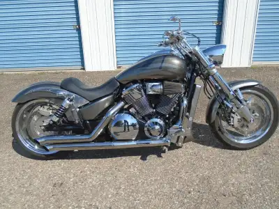over $25000 in custom parts and labour above the orginal cost of the VTX fuel injected,liquid cooled...
