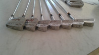 Assortment of golf clubs