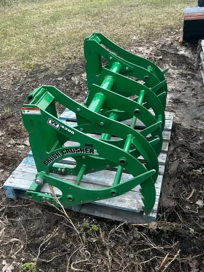Brush Crusher 4215 mechanical grapple. Fits John Deere compact tractor. No extra hydraulics needed....