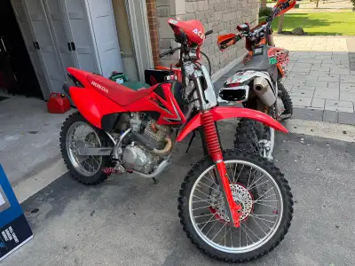 A very clean and reliable 2009 Honda Crf 230F. Adult trail ridden. Very well maintained. Lots of ano...