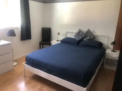 Fully furnished all inclusive master bedroom with 1/2 bathroom ensuite in a sharing house with other...