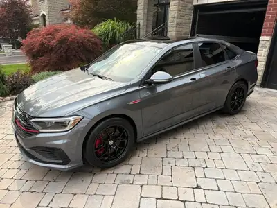 LOW Mileage and Extremely Well maintained 2019 Jetta GLI. The exterior colour is Platinum Grey Metal...