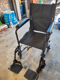 Transport wheelchair 