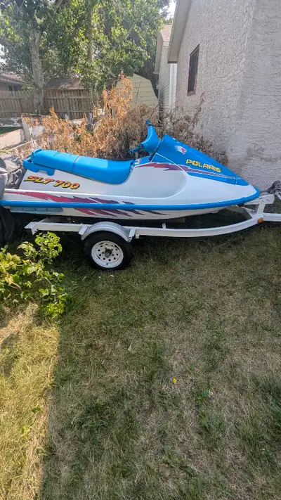 Selling as a pair, seadoo and trailer are in good shape however the engine is kaput!!