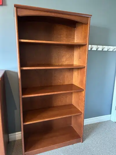 Solid maple bookshelf in excellent condition. Dimensions: W=30”, D=12”, H=60”.