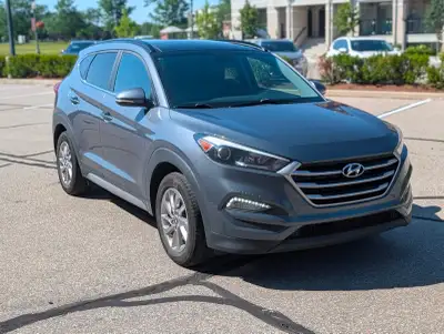 **2017 Hyundai Tucson AWD – Leather, Panoramic Sunroof, Navigation – 212,000 km** Well-equipped and...