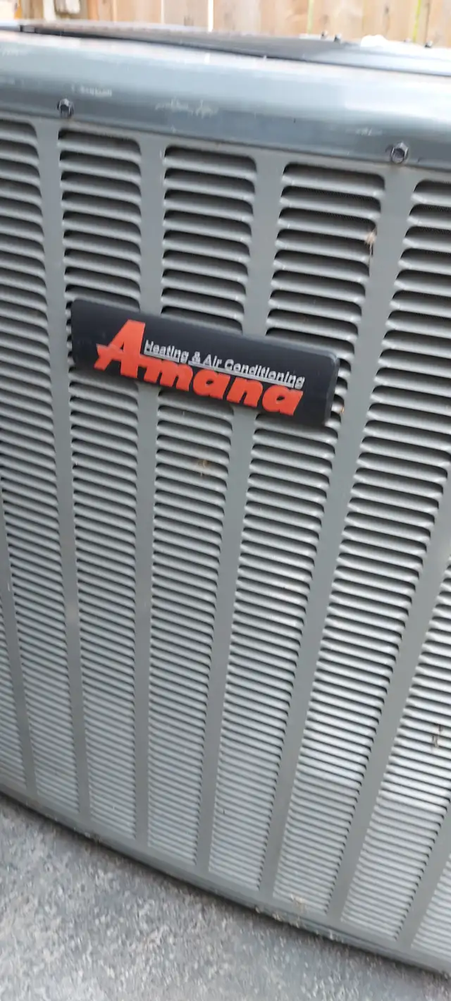 Amana Heating & Air Conditioning Unit