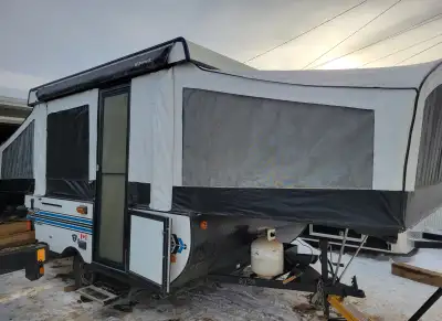 It has two pop out beds. A front queen and a rear full bed. Dinette turns into bed. Sleeps 5-6. Stov...