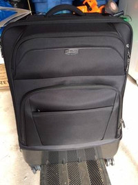 Checked luggage $250 28” Ricardo Beverly Hills Wilshire