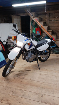 Trade 2021 Suzuki DR650 dual sport motorcycle for four wheeler.