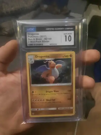 175 OBO This is a 2017 Dragonite 96/149 Sun & Moon Cosmos Holo card, graded Gem Mint 10 by CGC. It's...