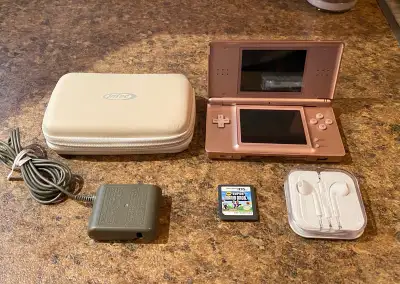 Nintendo DS lite with Super Mario Bros game , View more