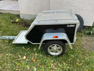 Excellent condition motorcycle trailer all aluminum body very light to pull lots of storage comes wi...