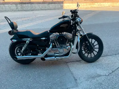 2010 Harley Davidson 883XL extras included single seat saddle bags and stock pipes