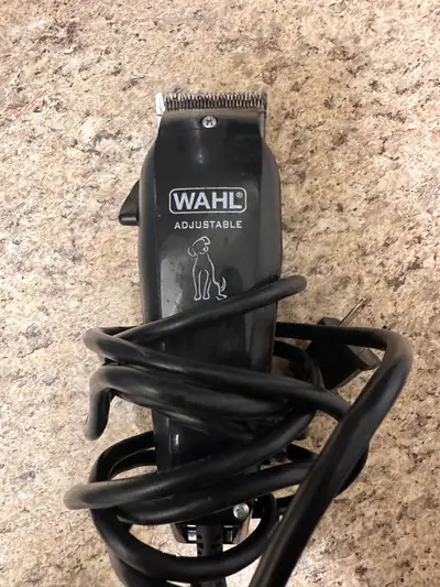 This Wahl dog clipper is a reliable grooming tool, perfect for keeping your furry friend looking the...