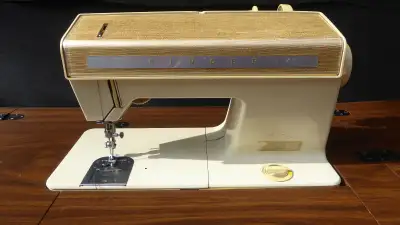 Sing sewing machine with table/cabinet/stool with storage, View more