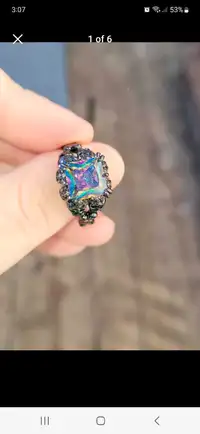 Unique skull ring with Mystic Topaz and CZ.  Size 9