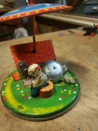 Antique YONE wind-up tin toy