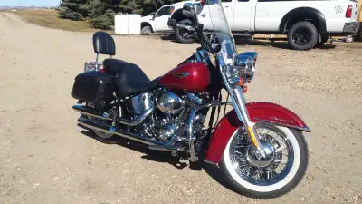 '06' Harley Softail Deluxe ( FLSTNI). 88 c.i. twin cam with stage one tune. Extras include: chrome f...