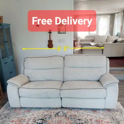 Selling this lovely gray fabric reclining sofa in excellent condition. No stains, no damages. FEATUR...