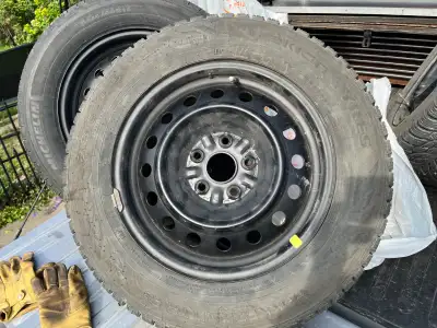 2007 toyta camry winter tires on rims used two winters less than 5000 k on them see pictures paid 80...