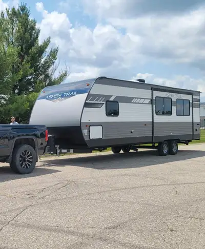 We are selling our 2022 Aspen Trail 2880RKS. It has an amazing open concept floor plan, with a brigh...
