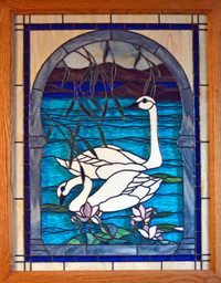 Handmade stained glass with precision.Swan