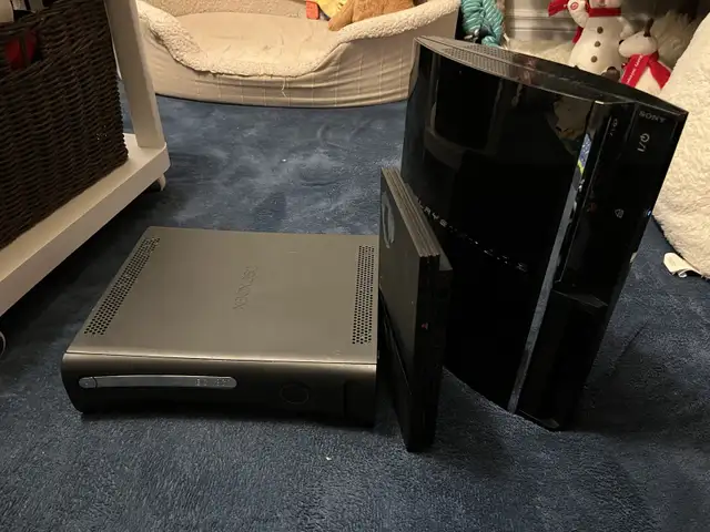 Three Video Game Consoles64985463520898121