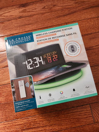 Wireless charging station with clock and outside temperature