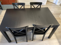 IKEA extendable dining table with 4 chairs