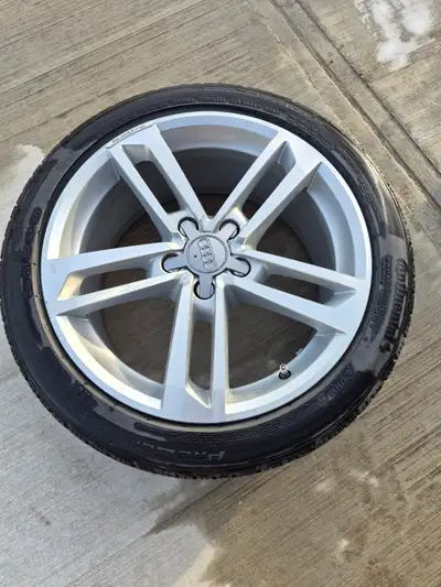 18 inch Audi TT OEM Rims , upgraded center caps , and all season tires , good condition...a couple o...