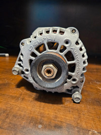 Used Alternator out of a Chevy k1500 Suburban 5.7L Vortec