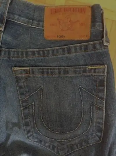 New condition-Size:33. True Religion Men Jean. Made in USA, View more