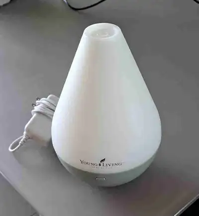 This Ad is for one Young Living Essential Oils Atomizer with built in LED lights. Power cord include...