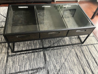 Glass and metal coffee table with wooden drawers
