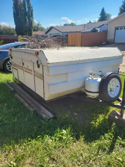Tent trailer needs TLC. Inside is ok but exterior ( Canvas and roof corners) are rough. Crank is har...