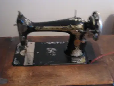 vintage sewing machine serial # JA195527 in good condition but missing couple parts belt bobbin and...