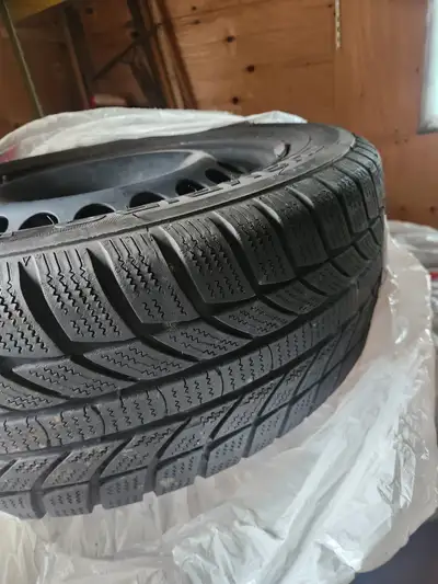 1. Newer winter tires on new steel rims. Balanced. 205/55 R16 5 bolt pattern x 112.3. $300 or best o...