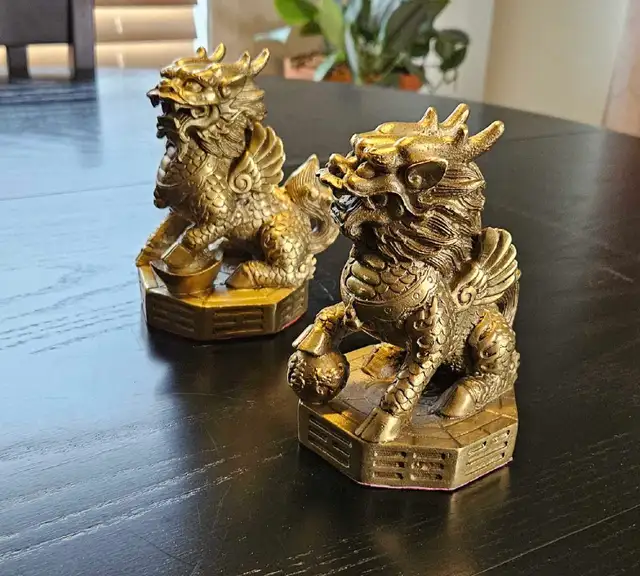 Pair of Golden Metal Foo Dogs.