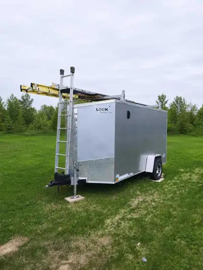6x12 v-nose cargo trailer 3500lb axle Waterproof floor Ladder racks Upgraded leaf springs New bearin...