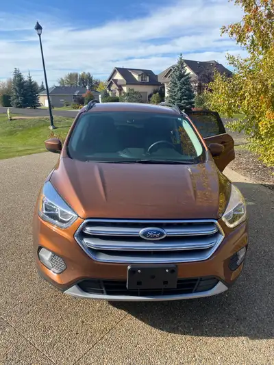 Really great car low kilometres! Comes with winter tires on rims. Has a back up camera and car play....