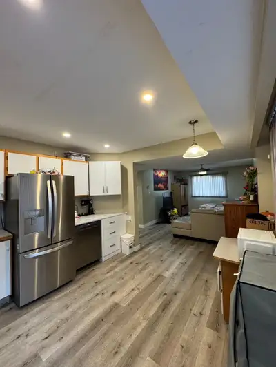 Large 1 bedroom suite level ground. Full bathroom and living room and dining area and kitchen with d...
