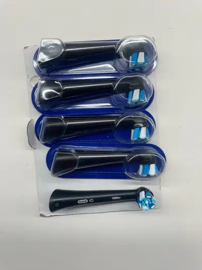 new Oral-B iO Series black toothbrush replacement heads, featuring innovative iO technology for a pr...